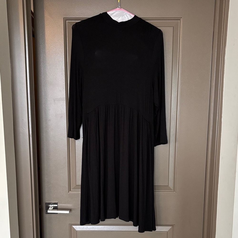 Black, mock neck, knee length dress
